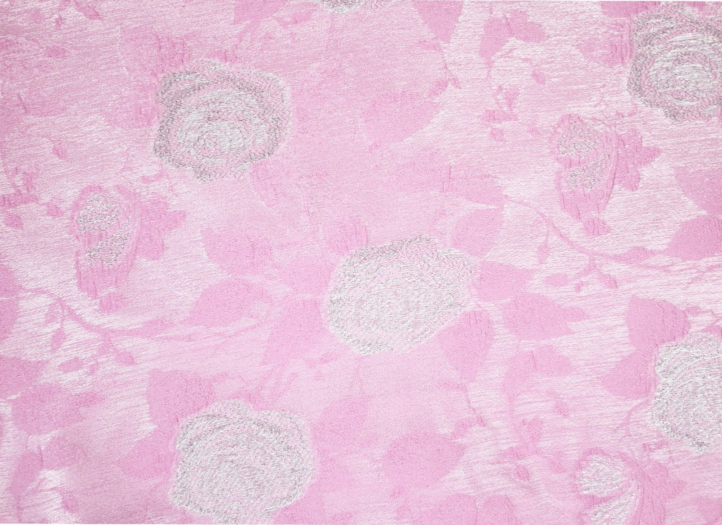 Pink fabric with white floral patterns
