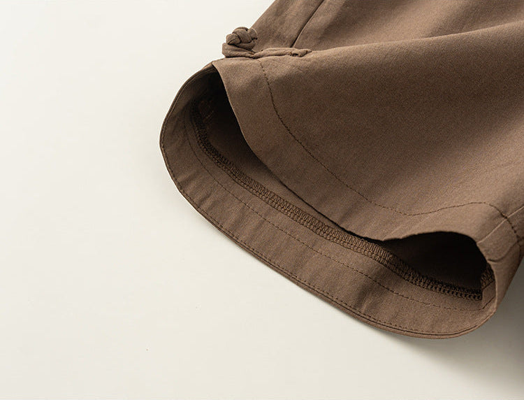 Brown fabric with a textured surface on a beige background