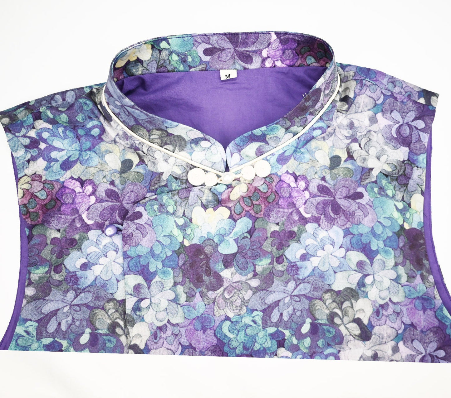Floral patterned garment with a purple background
