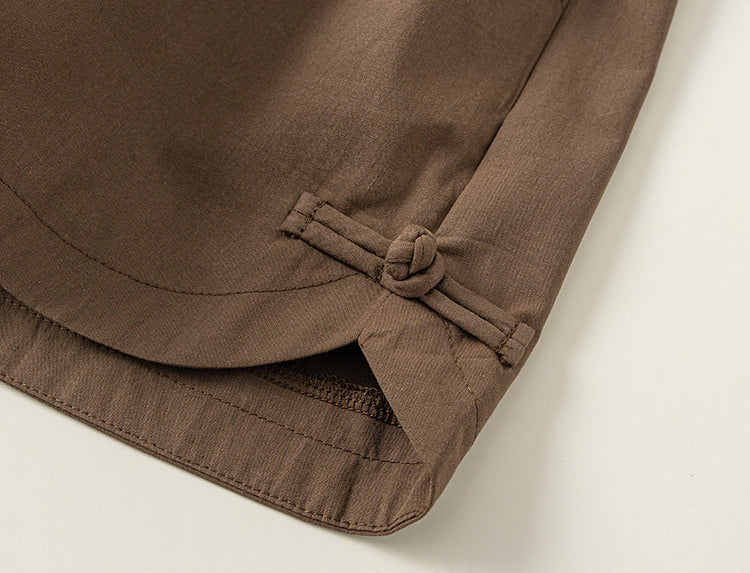 Brown fabric with a tie detail on a white background