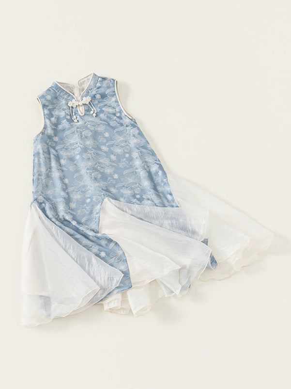 Light blue and white dress with floral pattern on a white background, branded with M.bang.