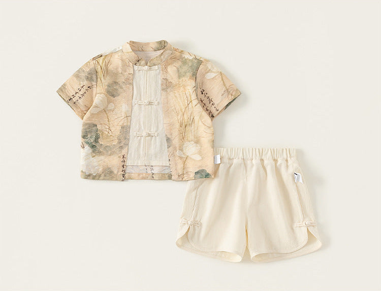 Children's outfit with a patterned shirt and shorts on a light background