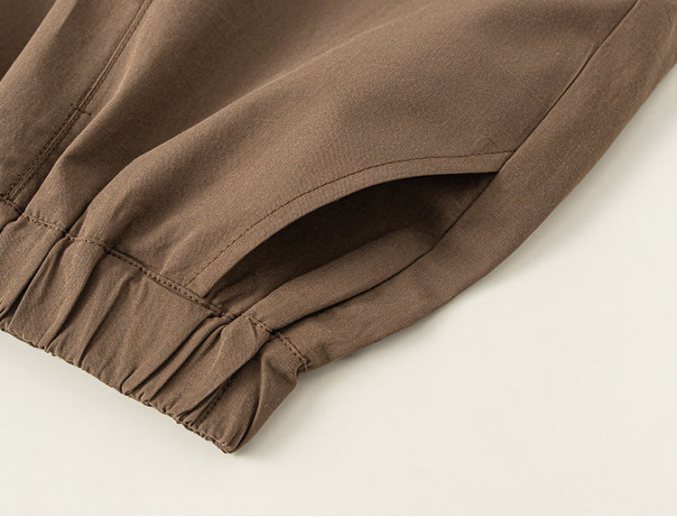 Close-up of brown fabric on a beige background