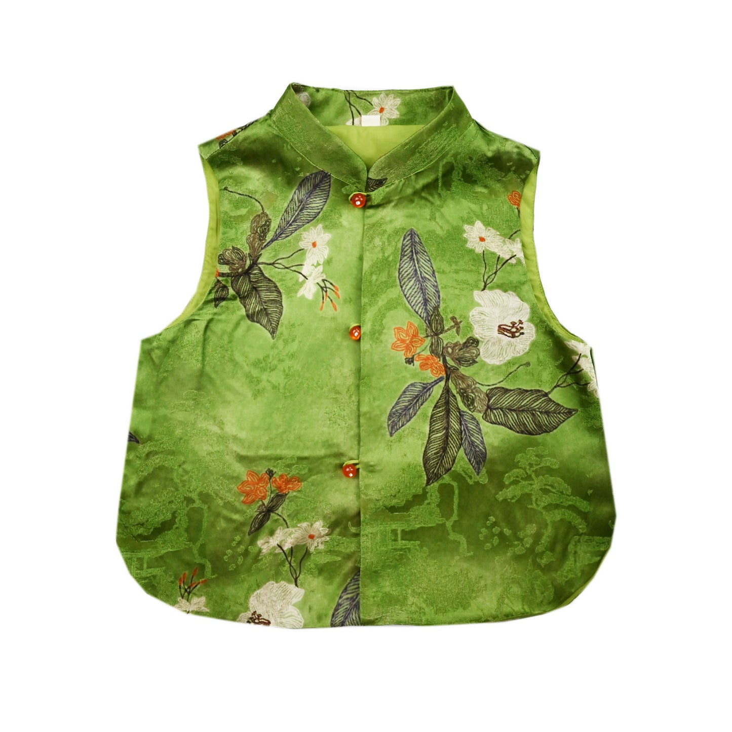 Green sleeveless shirt with floral patterns on a white background
